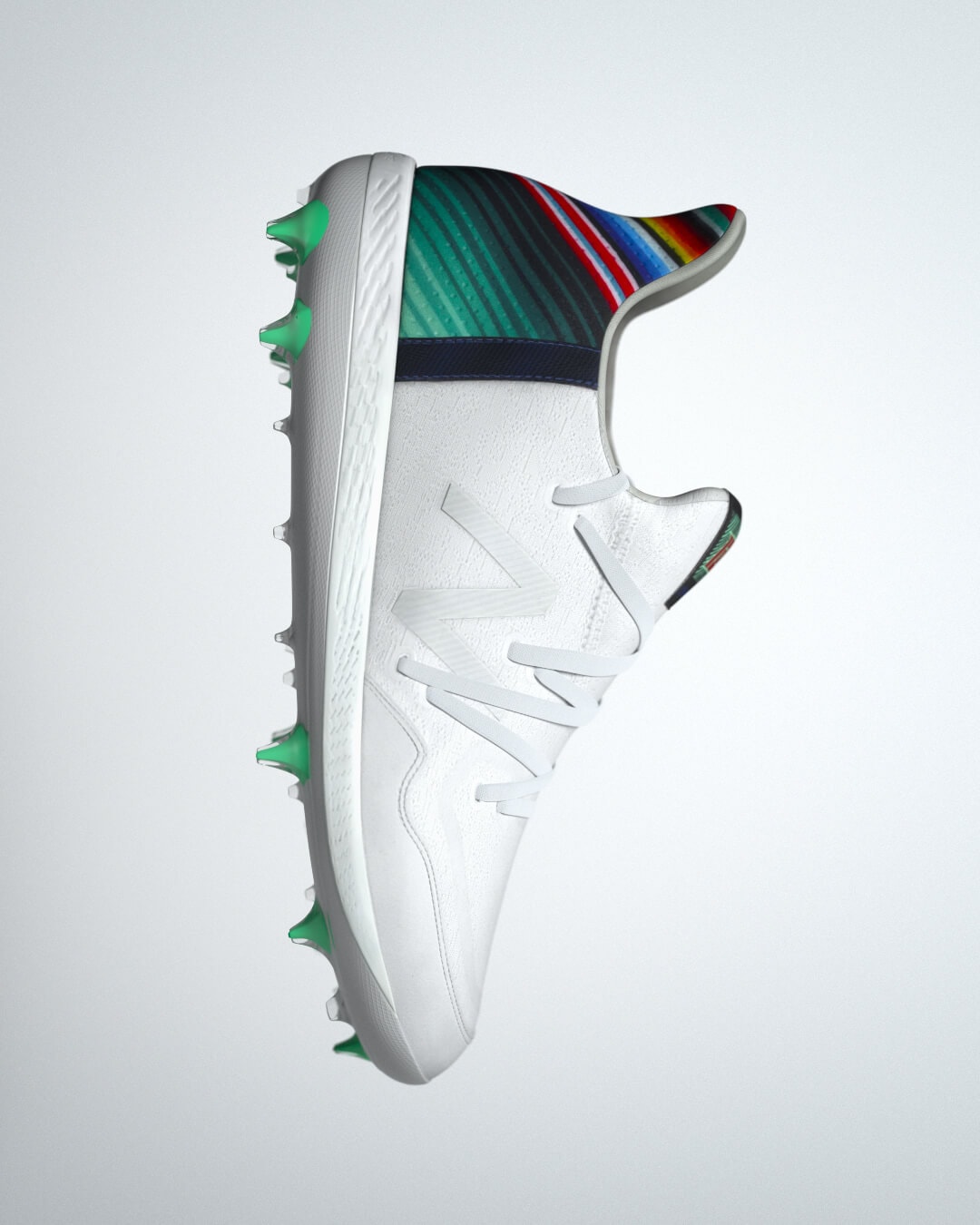 A white New Balance cleat with a multicolored heel.