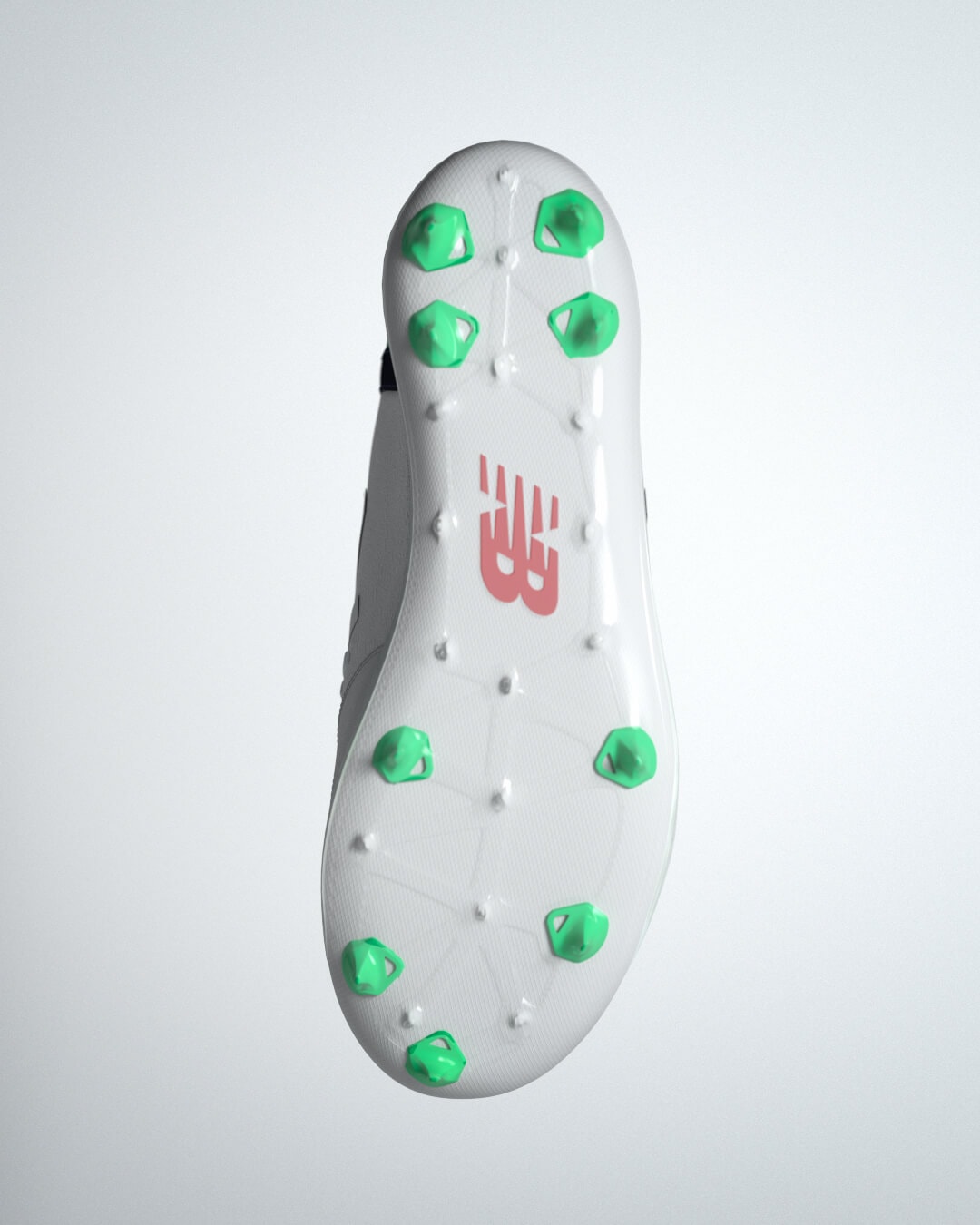The sole of a white cleat with green studs.