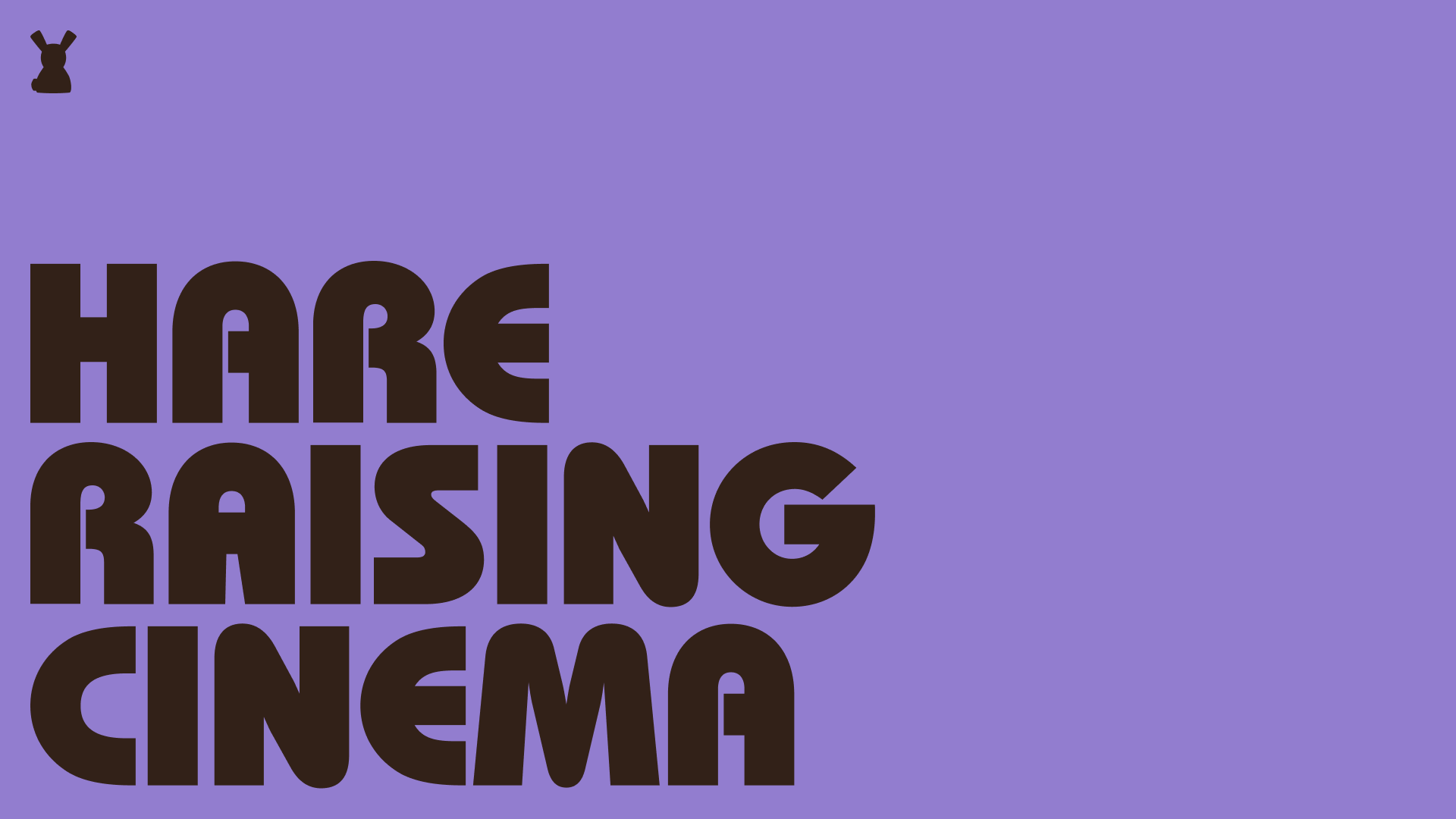 Dark Hare Raising Cinema lettering on purple.