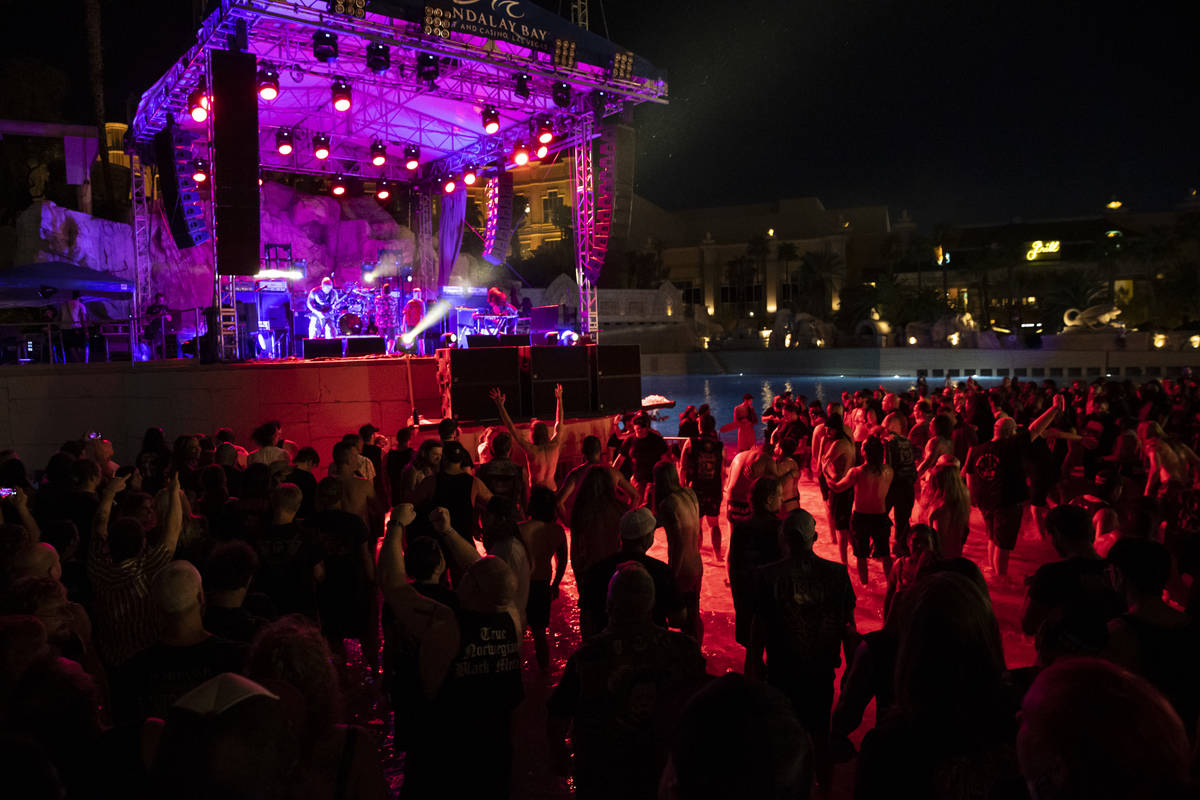 A crowd watches an outdoor Psycho Las Vegas stage at night.